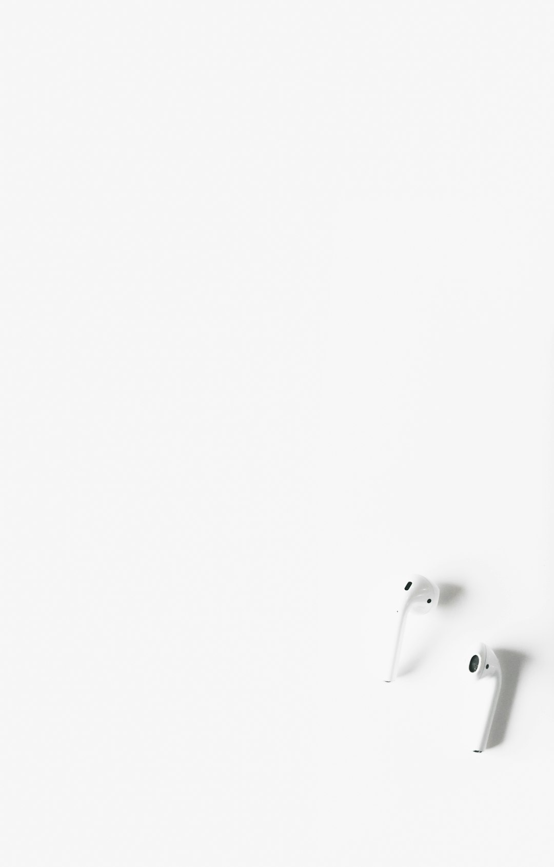 Service Flatlay photo of an airpod